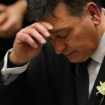 Finance Minister Charles Sousa reads Ontario's latest provincial budget at Queen's Park in Toronto on March 28.