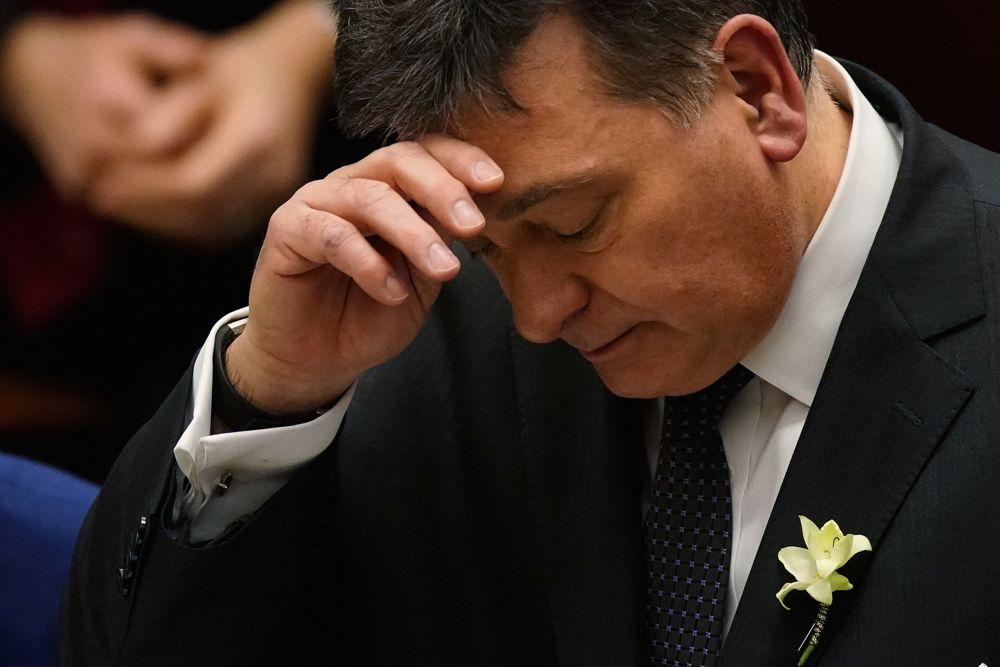 Finance Minister Charles Sousa reads Ontario's latest provincial budget at Queen's Park in Toronto on March 28.