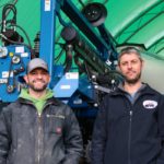 Geoff, left, and Mike Strang modified a new planter to plant two different hybrids of corn in one planting pass.