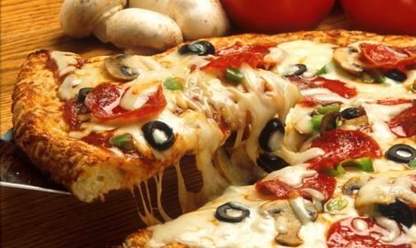 A new class of milk for restaurant mozzarella ”will lower costs for restaurants that prepare and cook pizzas on-site,” the federal government says. (Scott Bauer photo courtesy ARS/USDA)
