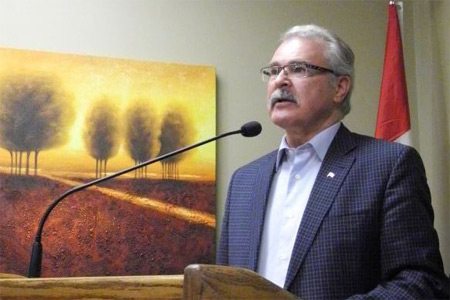 Agriculture Minister Gerry Ritz, shown here speaking in Saskatoon in March, said he doesn’t entertain the idea of expanding U.S. access to Canada’s dairy market. (Agriculture and Agri-Food Canada photo)
