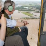 Prime Minister Stephen Harper (right) and Manitoba Premier Greg Selinger survey flood damage in the Brandon area from the air on Sunday. (PMO photo by Jill Thompson)