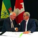 Federal Agriculture Minister Lawrence MacAulay and his Saskatchewan counterpart Lyle Stewart signed onto a general agreement for a five-year federal/provincial funding framework on July 21. (Saskatchewan.ca)