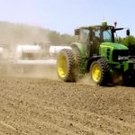 Wayne Vitek plants soybeans with a Smart Firmer on the planter.