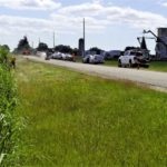 A film crew builds a whole new rural church – made to look old, across from the miscanthus field of farmer Scott Abercrombie.