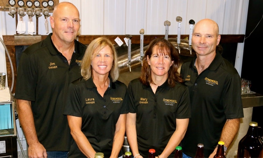 Jim Soetmans, left, Laura Soetmans, Mary Donkers and Joe Donkers are owners of Stonepicker Brewing near Forest.