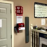 Defibrillators can be placed in a central location, and provide instructions and voice prompts on how to use the device, such as this defibrillator at the Vista Villa Farms office.