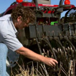 Steve Shirtliffe demonstrates a min-till rotary hoe.
