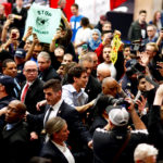 Prime Minister Justin Trudeau exists a gymnasium following a town hall meeting in Nanaimo, B.C. on Feb. 2, 2018.