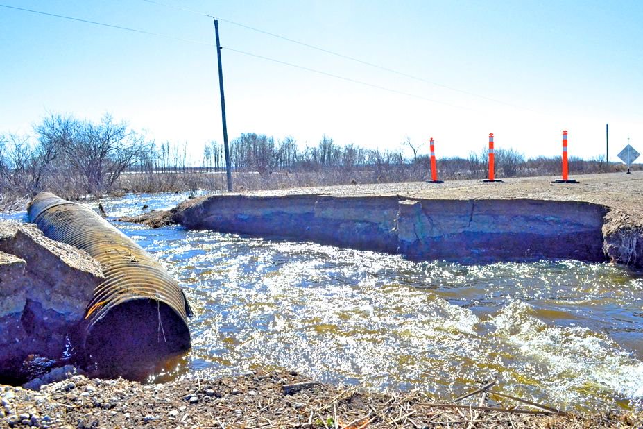 A washout on Manitoba PR 346 south of Brandon in April 2017. (Manitoba Co-operator file photo by Alexis Stockford)
