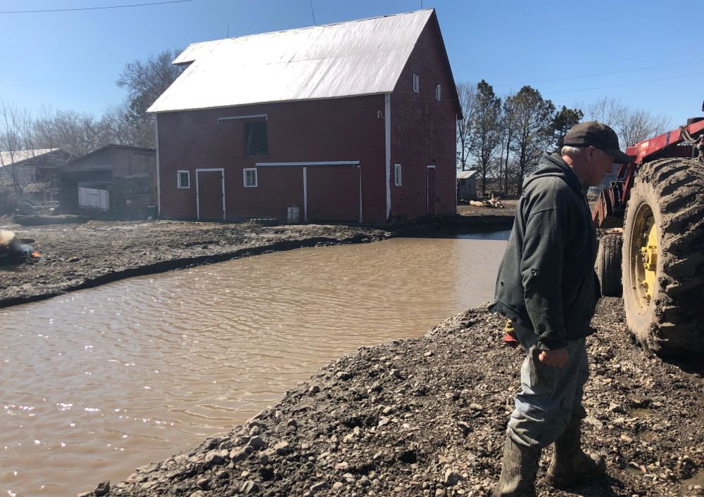 Tom Geisler surveys damage to his farm, following flooding at Winslow, Neb., northwest of Omaha, on March 20, 2019. (Photo: Reuters/Humeyra Pamuk)

