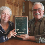 Bonnie Wilson and Doug Gray display the Mapleseed Pasture Award they recently won at the Beef Farmers of Ontario annual meeting.