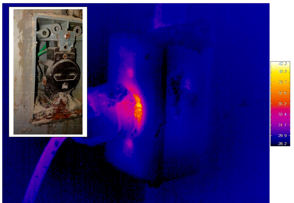 A thermal imaging view of a corroded wall plug.