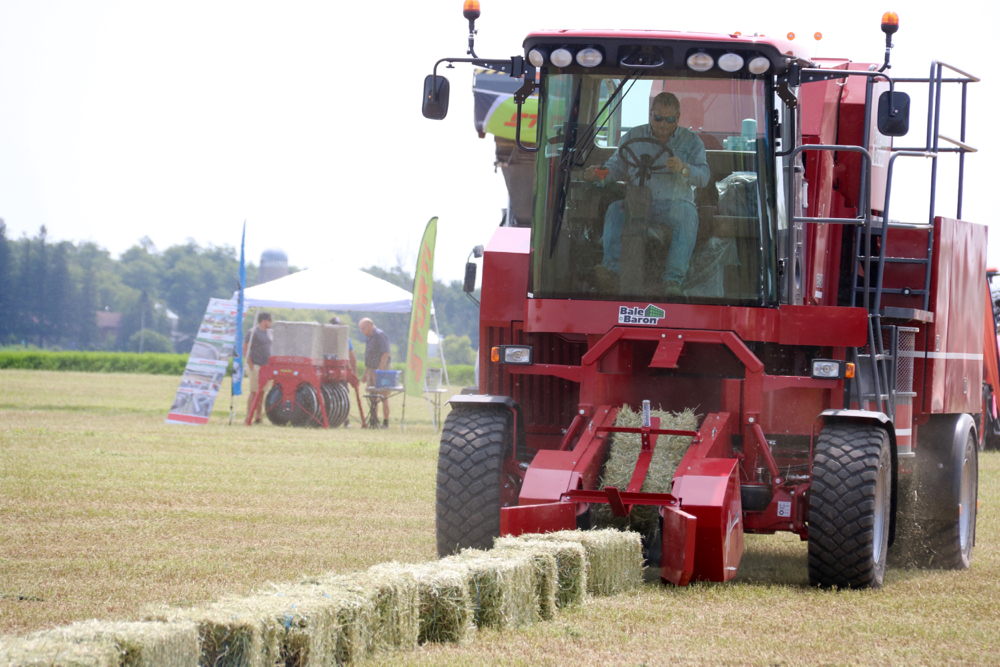 Marcrest Manufacturing demonstrated its self-propelled Bale Baron that can pick up small square bales and make them into a larger unit for moving with a loader.