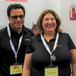 John Wiebe with EastGen and Jayne Jackson at the 2019 Ontario Pork Congress where they talked about PigCHAMP’s new partnership with EastGen.