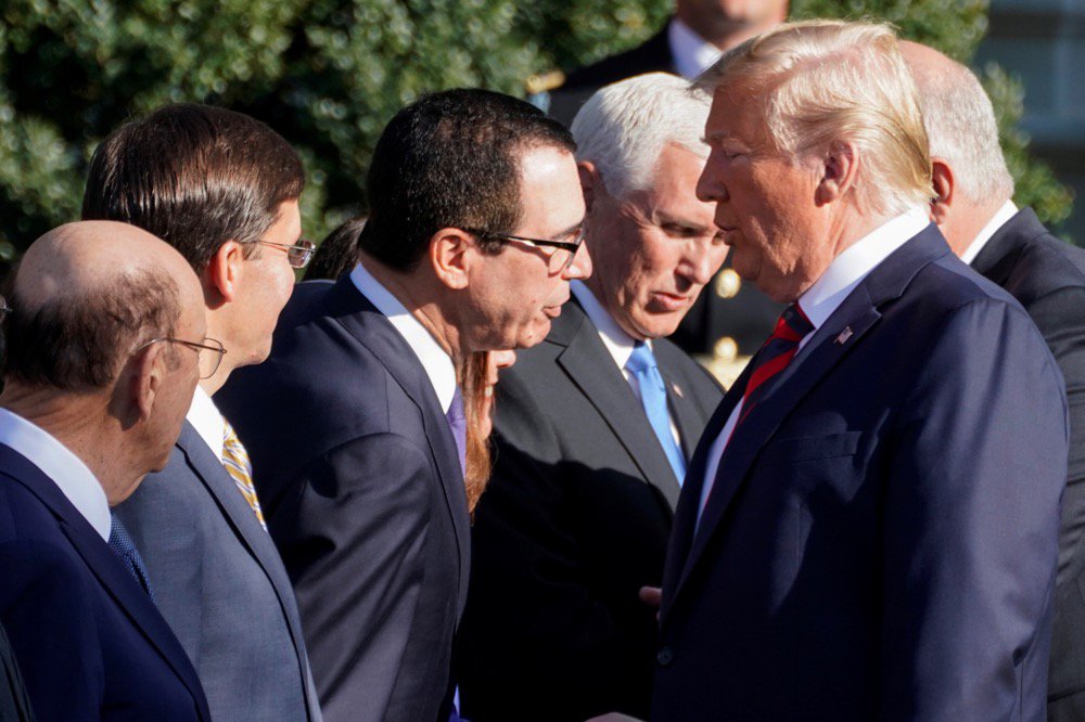 U.S. President Donald Trump speaks with U.S. Treasury Secretary Steven Mnuchin on the South Lawn of the White House in Washington, D.C. on Sept. 20, 2019. (Photo: Reuters/Joshua Roberts)
