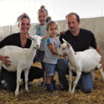 Jony and Jan Roos, along with daughters Janine, four and Jessica, three. Their other children include Julian, eight and Joanna, six. They milk 2,000 to 2,500 goats near Culloden.