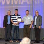 Brent Ericson, GROWMARK senior VP of Member Business, left, and Mike Turner, VP of Midwest Operations, present the management excellence award to Lucknow District Co-operative President David Gibson and General Manager Allan Scott.