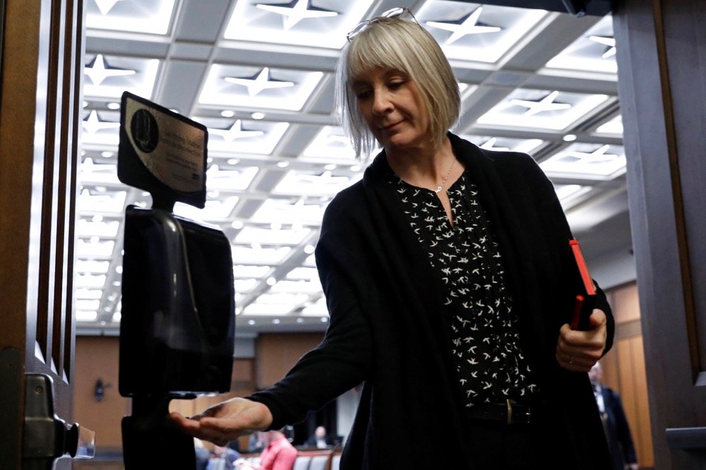 Federal Health Minister Patty Hajdu leaves a news conference in Ottawa on March 23, 2020. (Photo: Reuters/Blair Gable)
