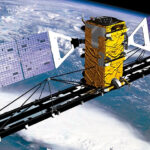 An illustration of the Canadian Space Agency’s RADARSAT-2 satellite above Earth.