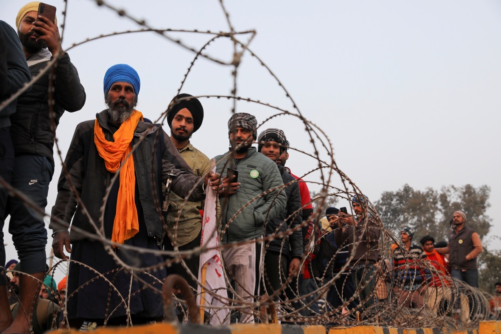 Farmers prepare for a rally against India’s newly passed farm laws ahead of Republic Day at Singhu border near New Delhi on Jan. 25, 2021. (Photo: Reyters/Anushree Fadnavis)
