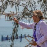 Fiona Lake setting off a drone.