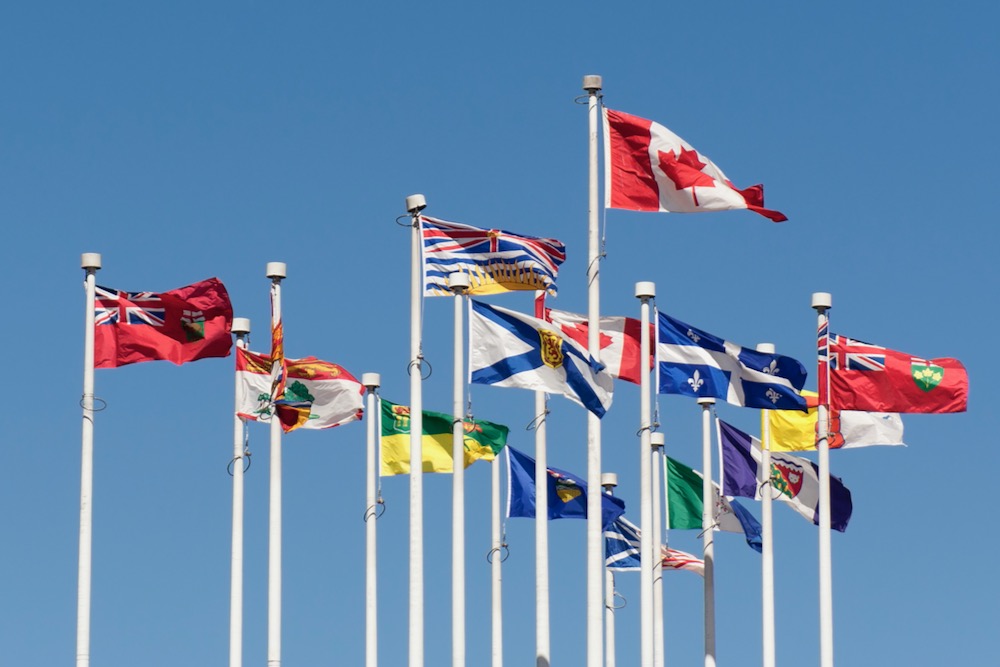 File photo of the flags of Canada and its provinces and territories at Canada Place in Vancouver. (lilly3/iStock/Getty Images)
