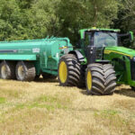 With an aim to reduce the dust created by dual tires driving off the paved shoulder of the roadway, Elmira-based custom liquid manure hauling company Pit King is testing single, 1,400-millimetre tires on one of its tractors.