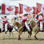 Canadian Cowgirls returned to the ring with their patriotic outfits and precision riding, much to the delight of the Orangeville crowd.