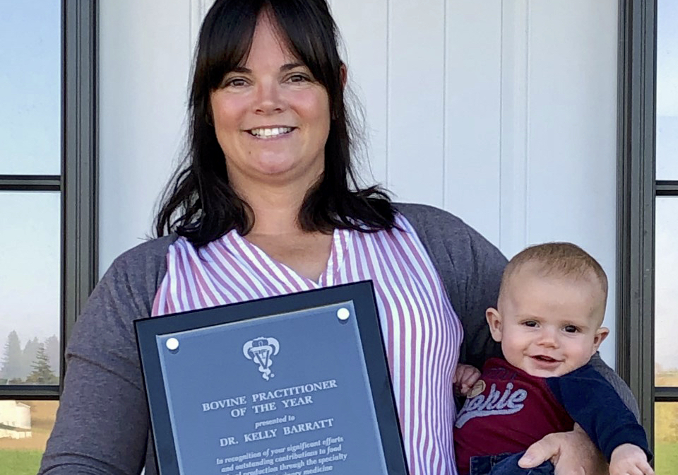 Dr. Kelly Barratt, pictured with her son Archie, was awarded the 2021 AABP Bovine Practitioner of the Year award for her leadership and contributions to the North American bovine industry.