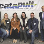 Catapult Grey Bruce chair Courtney Denard, far left, vice-chair, Mia Toose, director Courtney Miller, executive director Jen Christie, Mike Comello, treasurer, and Grey County Warden Selwyn Hicks marked the grand opening of Crashpad, an entrepreneurial acceleration and advisory space, at the Sydenham Campus: Regional Skills Training, Trades and Innovation Centre in Owen Sound, Dec. 2, 2021.