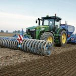 This is a typical European planting setup, says Lemken’s Mark VanDeursen. The tractor carries a 20-foot-wide hydraulic downforce packer at the front, a 20-foot wide, three-point hitch drill at the back, pulling a cart with seed and fertilizer. In some situations, the rig can do this operation directly into a plowed field. The updated version of VarioPack has heavier packing wheels.