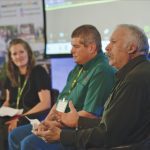 Mike Buis, far right, speaks during a panel session at the recent Farm and Food Care Ontario annual meeting on how the pandemic has altered agricultural on-farm business models, while Marianne Edwards of Sheldon Creek Dairy, far left, and Kevin Snyder, of Snyder Heritage Farms, listen.