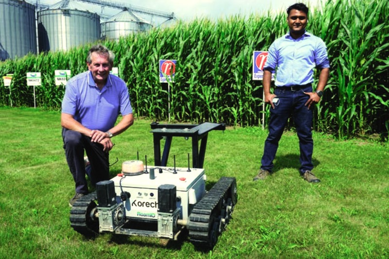 Sougata Pahari (r) and Jim Clark (l) of Korechi Innovations, pictured with one of their company’s prototype RoamIO robots at Haggerty Creek in 2020. The robot design was the foundation of a larger farm platform now used by the Bothwell business.