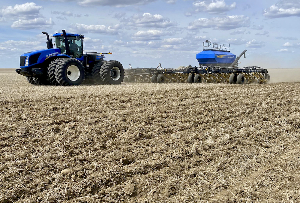 tractor seeding a crop