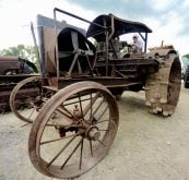 Gordon Brindley, known to many as Harry, sits on an All Work steel wheel, cross engine tractor over 100 years old. Brindley purchased it in Eastern Ontario, and while it needs some mild restoration, it was the rarest iron in the antique tractor auction and one of his favourite pieces.