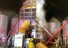 This nighttime photo shows the frustrating futility of fighting a dryer fire from the outside, and the danger to human safety.