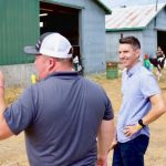 Andre Fortin, shown here at right in September at a community fair at Shawville, Que., about 75 km northwest of Ottawa, is the Quebec Liberals’ new critic for agriculture and health. (Andre Fortin via Facebook)