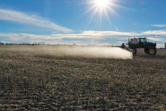 A spray boom creating pesticide drift. One of the main causes of spray drift is the production of fine sprays.