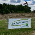 S.H. Dayton sponsorship signage at a 2018 motocross event. (S.H. Dayton Ltd. via Twitter)