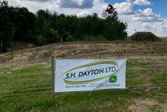 S.H. Dayton sponsorship signage at a 2018 motocross event. (S.H. Dayton Ltd. via Twitter)