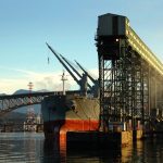 The federal government aims to increase exports and industry sales while reducing greenhouse gas emissions.