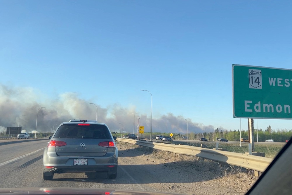 Smoke rises from a wildfire in Alberta’s Strathcona County, east of Edmonton, on May 5, 2023. (Photo: Video screengrab from @hellohildy on Twitter via Reuters)
