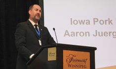 Iowa Pork Producers Association director Aaron Juergens speaks at the Manitoba Pork Council annual meeting
in Winnipeg April 13.