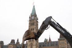 An excavator works on Parliament Hill on Oct. 22, 2019. (Photo: Reuters/Patrick Doyle)
