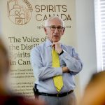 Jan Westcott explains to Collingwood community business associations and owners the importance of lobbying for spirit sales within grocery stores and the positive ripple effect it will have on smaller rural communities where the distiller grains are grown and processed.