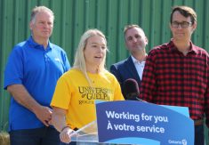 McKenna Morrison, at the podium says the Ontario Dairy Herd Apprenticeship Program has taught her skills she is applying to her job at a dairy farm near Thedford.