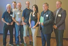 Winners of the Canada’s Outdoor Farm Show Innovation competition included (LtoR) Glen Yates and Colin Yates of VETSon, Matt Leinen of Ag Leader Technology, Mathieu Paneuf of Agrilog, Vanessa Camacho of Clean Works, and Greg Patterson and Rob Field of A&L Laboratories.
