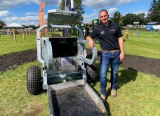 Marty Metzger, co-founder of StrongBo Agritech, shows the most recent iteration of the company's 100 per cent automated and portable livestock performance and health monitoring system for use in the barn or the field during Canada's Outdoor Farm Show.  