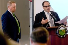 Grain Farmers of Ontario (GFO) chair Brendan Byrne, left, and Crosby Devitt, GFO CEO, discuss issues such as carbon tax exemptions, fertilizer tariffs, increasing input and inflation costs, and concerns about agriculture land protection.